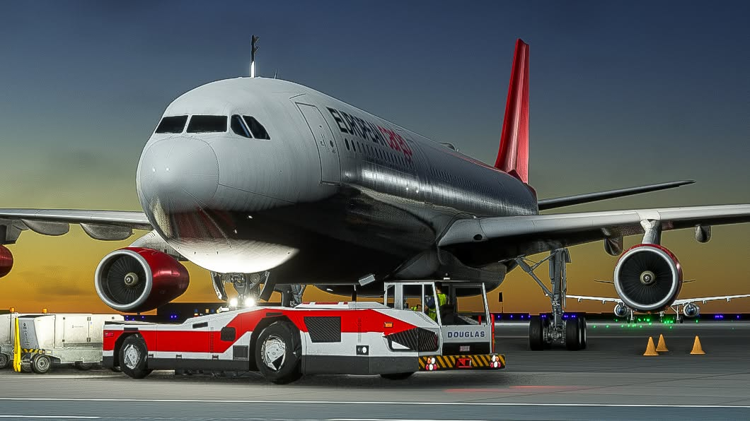 A340 with a tug on the ramp at dusk