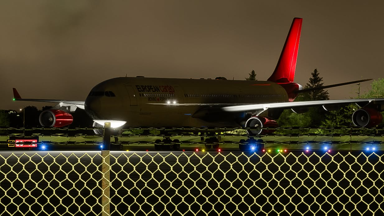 European Cargo aircraft illuminated at night